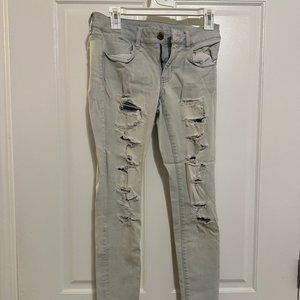 American Eagle Distressed Super Low Jegging in Light Wash